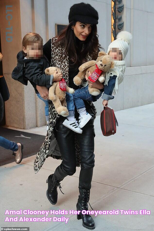 Amal Clooney holds her oneyearold twins Ella and Alexander Daily