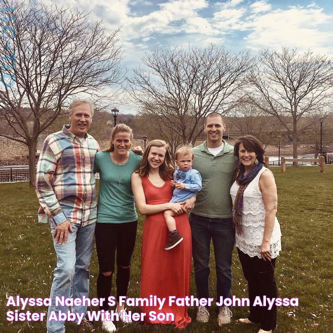 Alyssa Naeher’s family father, John, Alyssa, sister Abby with her son