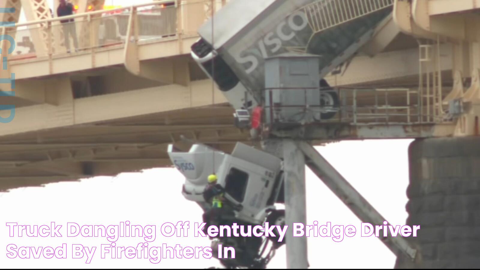 Truck dangling off Kentucky bridge Driver saved by firefighters in