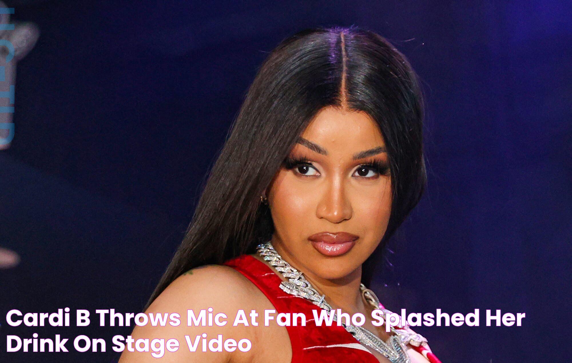 Cardi B throws mic at fan who splashed her drink on stage (Video