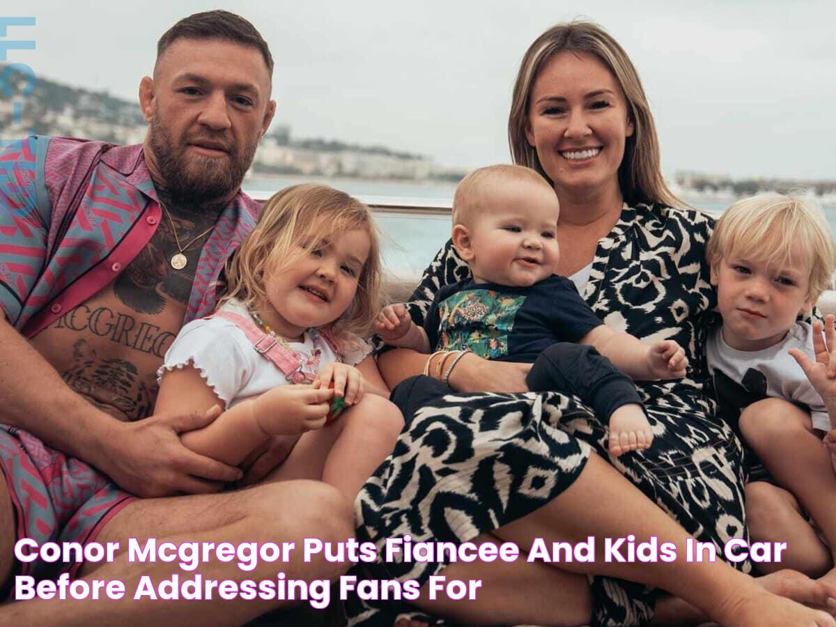 Conor McGregor puts fiancee and kids in car before addressing fans for