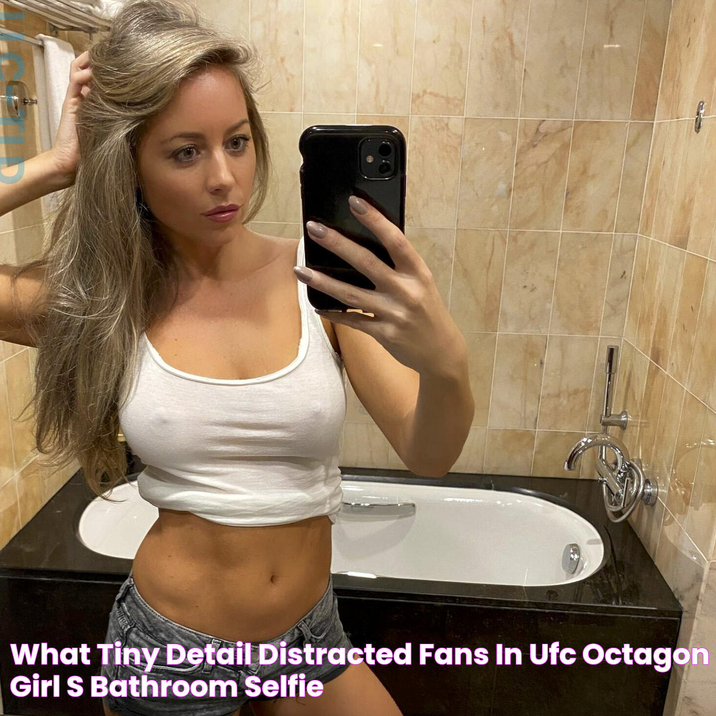 What 'tiny' detail distracted fans in UFC octagon girl's bathroom selfie