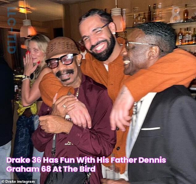 Drake, 36, has fun with his father Dennis Graham, 68, at The Bird