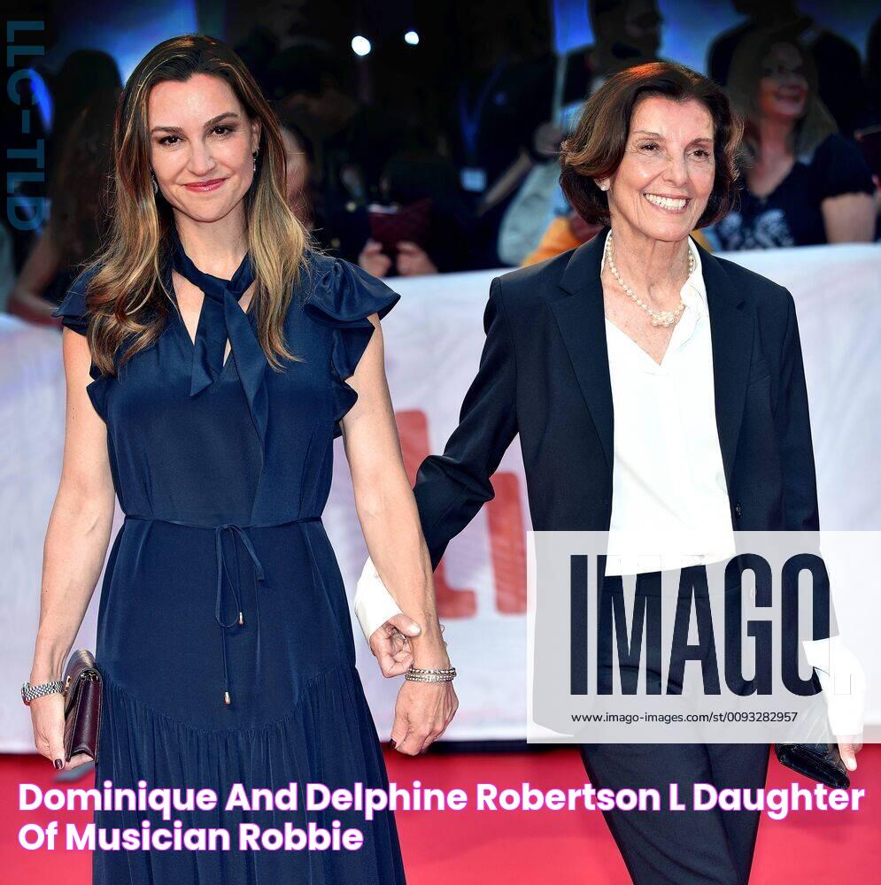 Dominique and Delphine Robertson (L), daughter of musician Robbie